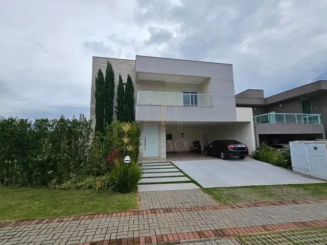 Imagem: A casa possui 5 Dormitórios, 4 Suítes, 5 Banheiros, 5