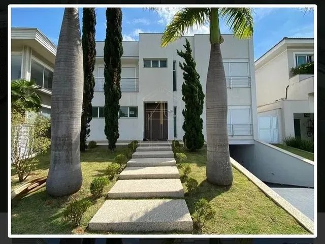 Imagem: A casa possui 4 Dormitórios, 4 Suítes, 5 Banheiros, 5