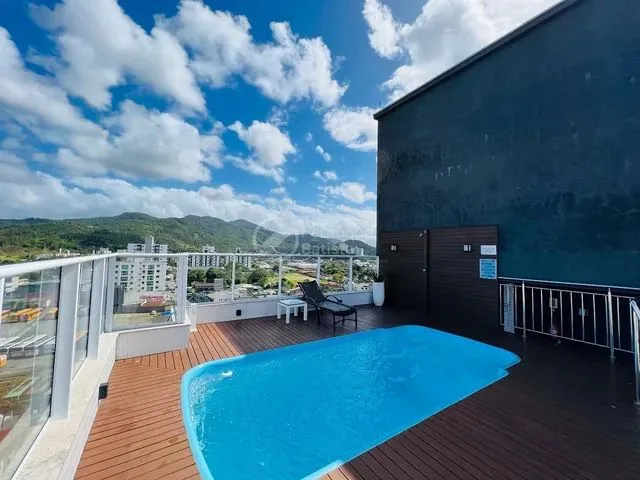 Imagem: O apartamento possui 2 Dormitórios, 1 Suíte, 2 Banheiros,