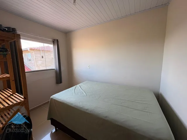 Imagem 2: Sobrado à venda em Guaratuba-PR, no bairro Coroados, (porteira fechada) com 4 quartos, 2