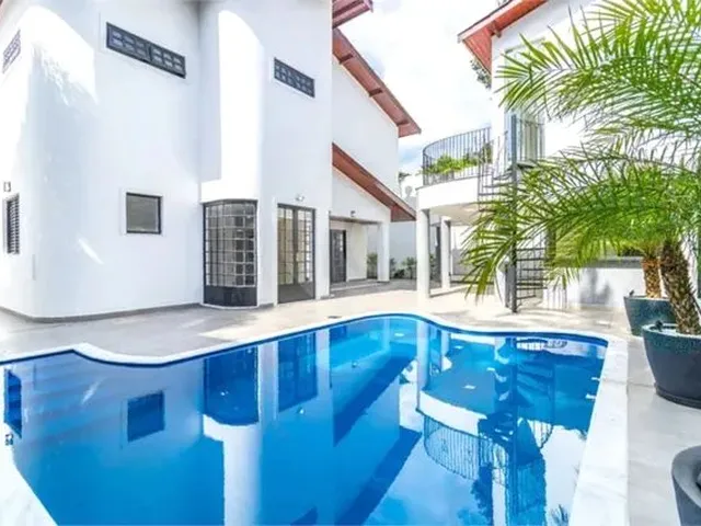 Imagem: A casa em condomínio possui 4 Dormitórios, 4 Suítes, 5