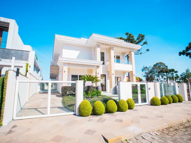 Imagem: A casa possui 5 Dormitórios, 5 Suítes, 7 Banheiros, 5