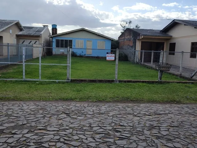 Imagem: A casa possui 2 Dormitórios, 1 Banheiro, 1 Vaga na garagem