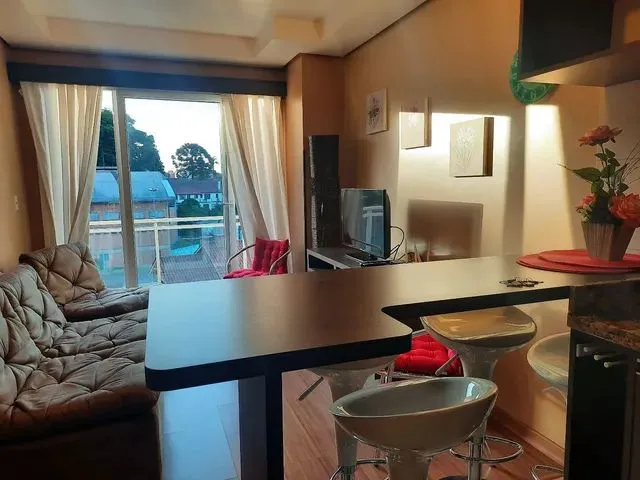 Imagem: O apartamento possui 2 Dormitórios, 1 Suíte, 2 Banheiros,