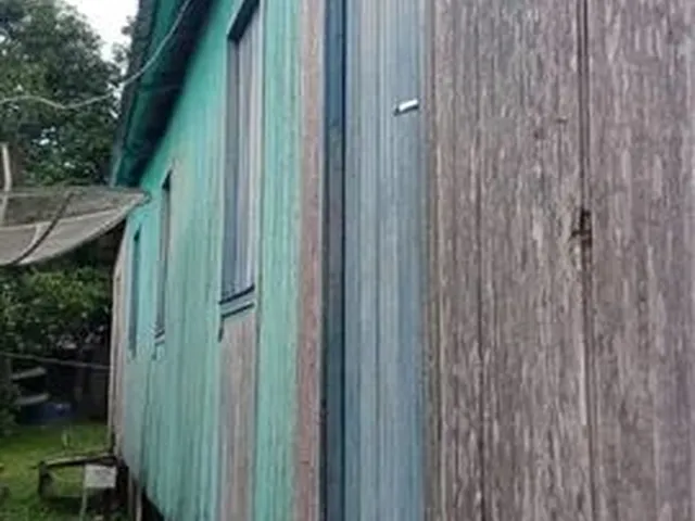 Imagem: A casa possui 2 Dormitórios, 1 Banheiro e está localizado
