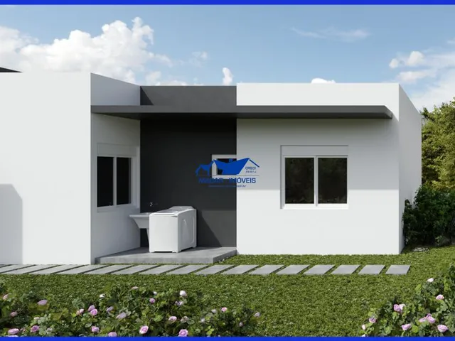 Imagem 3: Casa com 72,65 metros quadrados de área construída, pé direito alto, sala de estar