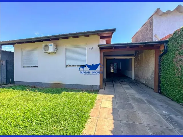 Imagem 3: Casa com 145 metros quadrados, 3 dormitórios, 3 garagens sendo 1 aberta, com quiosque e