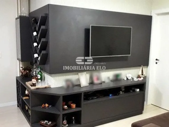 Imagem: O apartamento possui 4 Dormitórios, 1 Suíte, 2 Banheiros,