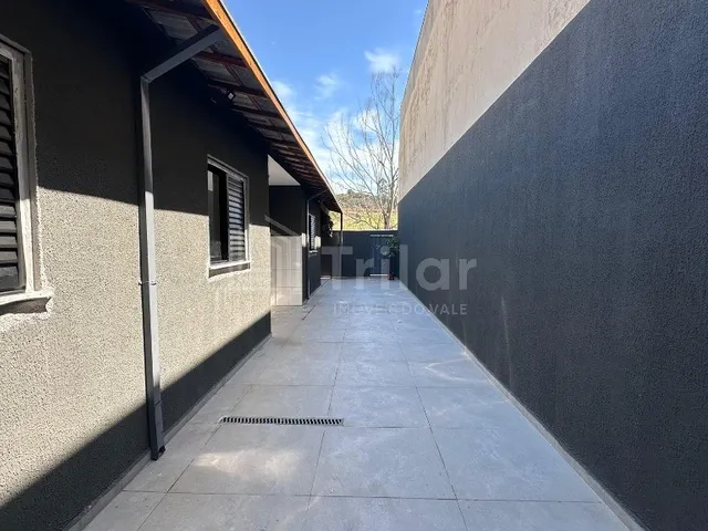 Imagem 4: Casa Moderna com 3 Dormitórios, Área Gourmet e Ambientes Integrados
