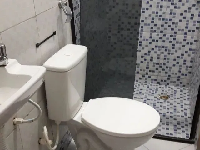 Imagem: A casa possui 3 Dormitórios, 2 Banheiros, 1 Vaga na