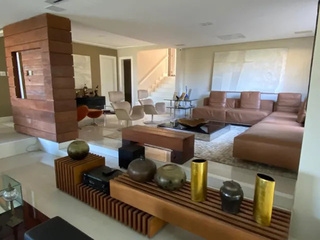 Imagem: A casa em condomínio possui 5 Dormitórios, 5 Suítes, 7