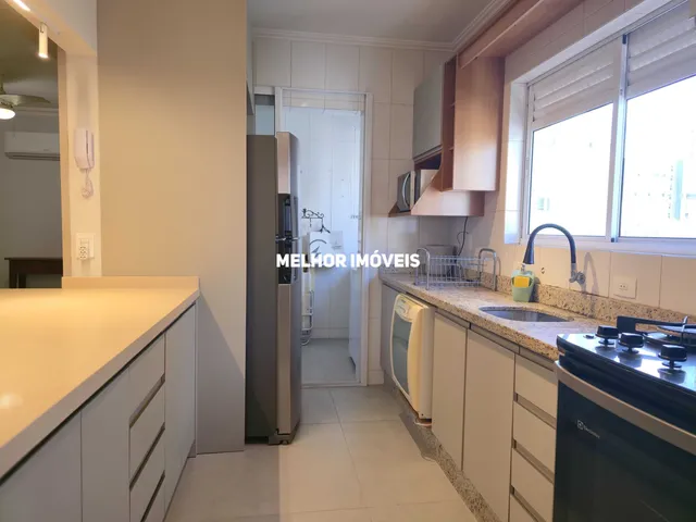 Imagem 3: Locação anual apartamento com sacada integrada com churrasquira á carvão