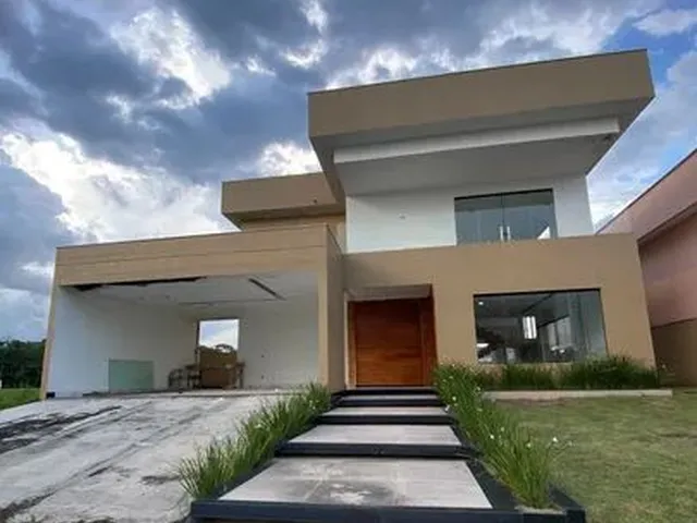 Imagem: A casa em condomínio possui 5 Dormitórios, 5 Suítes, 5