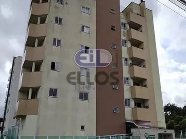 Imagem: O apartamento possui 2 Dormitórios, 1 Suíte, 2 Banheiros,