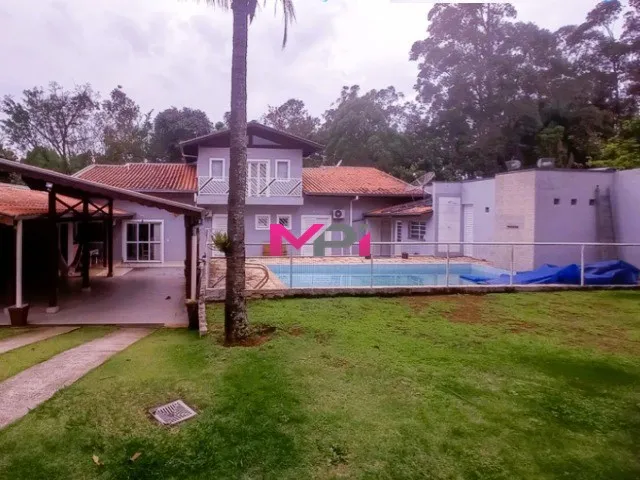 Imagem: A casa em condomínio possui 3 Dormitórios, 3 Suítes, 4