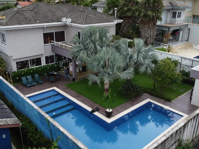 Imagem: A casa em condomínio possui 3 Dormitórios, 3 Suítes, 5