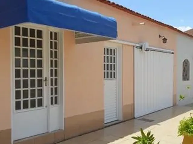 Imagem: A casa possui 4 Dormitórios, 3 Banheiros, 1 Vaga na