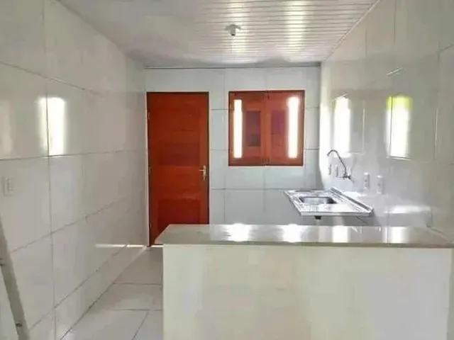Imagem 2: Casa com Dois Quartos e Garagem