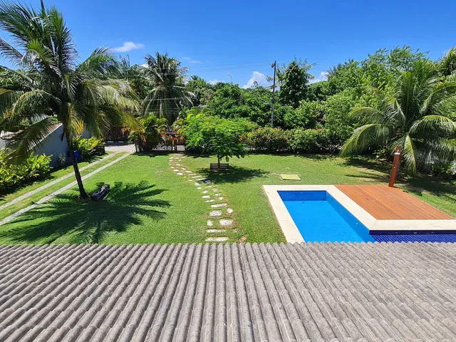 Imagem 7: Casa dos sonhos com 5 suítes, Combinação harmoniosa de natureza e conforto moderno
