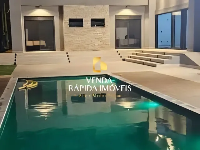 Imagem: A casa possui 6 Dormitórios, 4 Suítes, 5 Banheiros, 4