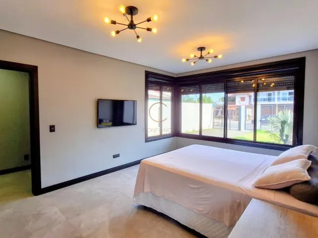 Imagem 12: Casa Térrea Contemporânea com Suíte Master, Espaço Gourmet e Pátio Amplo