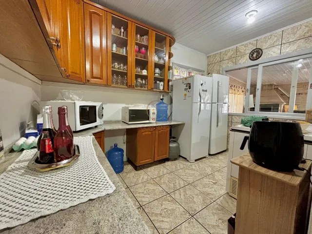 Imagem 4: Casa térrea com 3 dormitórios, duas vagas, amplo pátio. Excelente localização