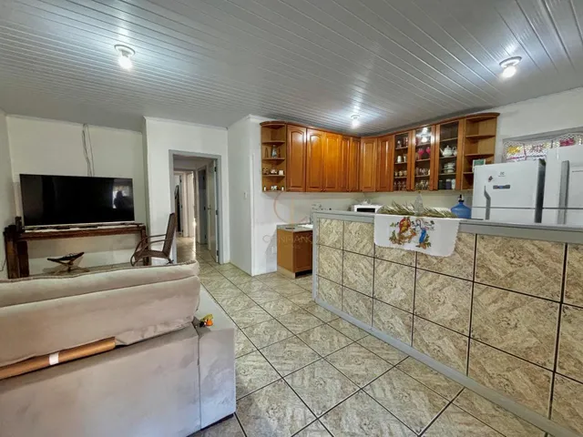 Imagem 5: Casa térrea com 3 dormitórios, duas vagas, amplo pátio. Excelente localização
