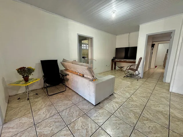 Imagem 11: Casa térrea com 3 dormitórios, duas vagas, amplo pátio. Excelente localização
