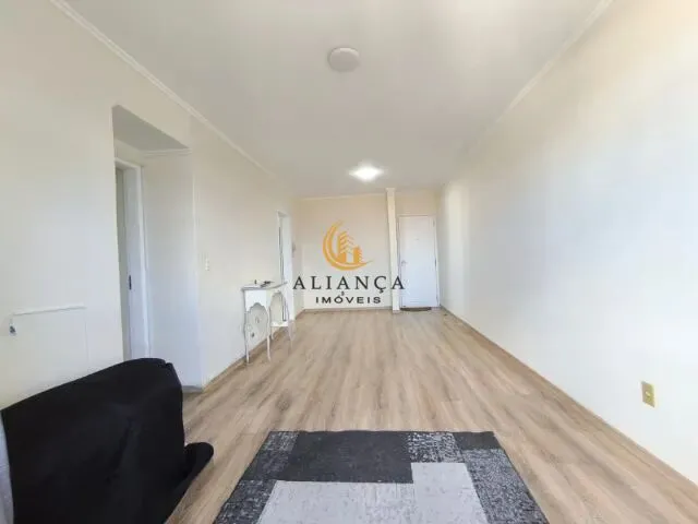 Imagem: O apartamento possui 3 Dormitórios, 1 Suíte, 1 Banheiro,