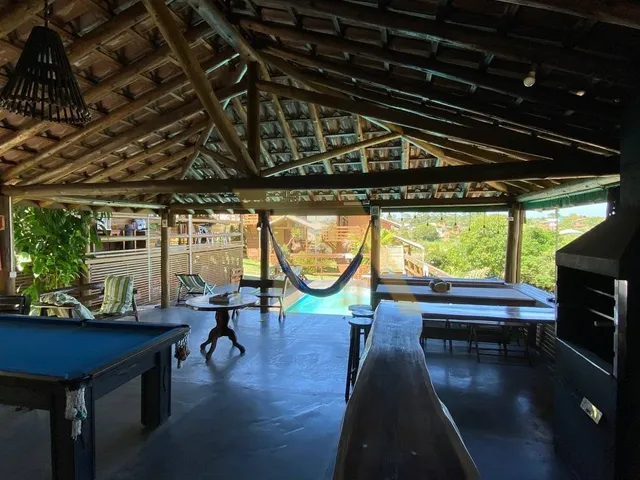 Imagem: Pousada com cabanas e casa principal na