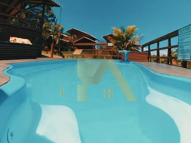 Imagem 9: Pousada com cabanas e casa principal na Praia do Rosa