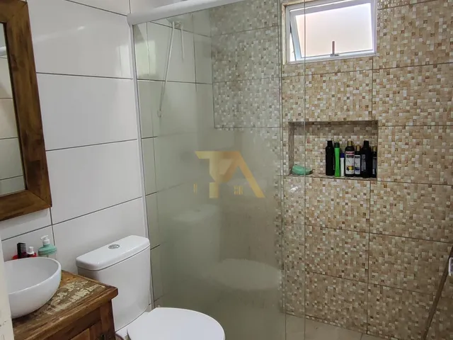 Imagem 2: Imóvel à venda em Imbituba-SC: Residência espaçosa com 4 quartos, 3 salas e 176m² no