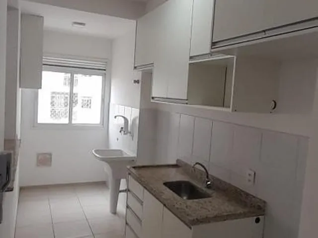 Imagem: O apartamento possui 2 Dormitórios, 1 Suíte, 2 Banheiros,