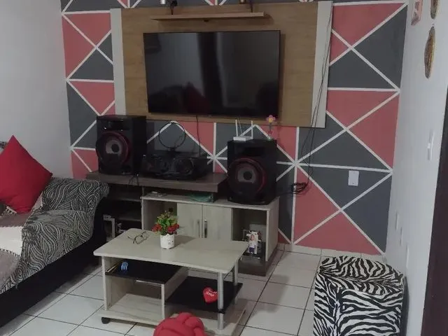 Imagem: A casa possui 2 Dormitórios, 2 Suítes, 3 Banheiros, 1