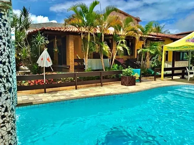 Imagem: A casa possui 4 Dormitórios, 2 Suítes, 3 Banheiros, 2