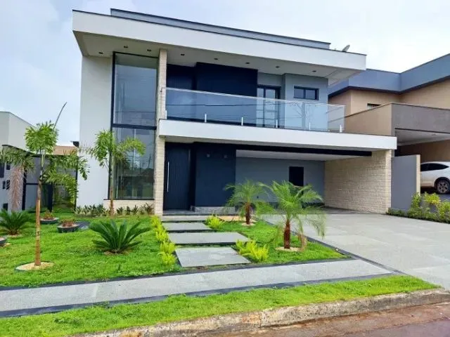 Imagem: A casa em condomínio possui 4 Dormitórios, 4 Suítes, 5