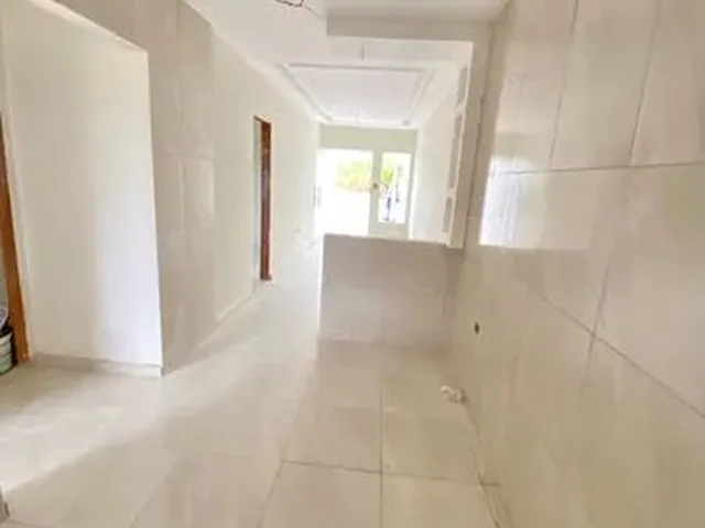 Imagem: O apartamento possui 2 Dormitórios, 1 Suíte, 2 Banheiros,