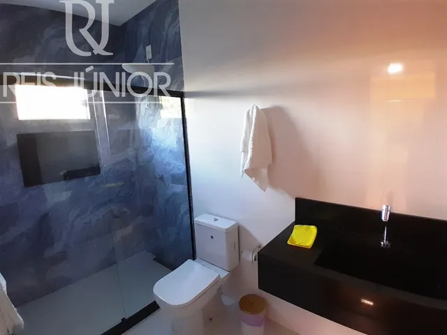 Imagem 8: Casa seminova, com terreno de 1.000 m² e piscina privativa