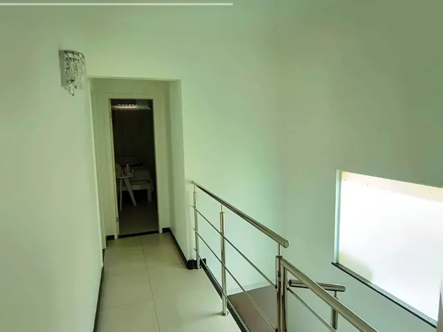 Imagem 6: Bem localizada com 3 suítes, piscina privativa e energia solar