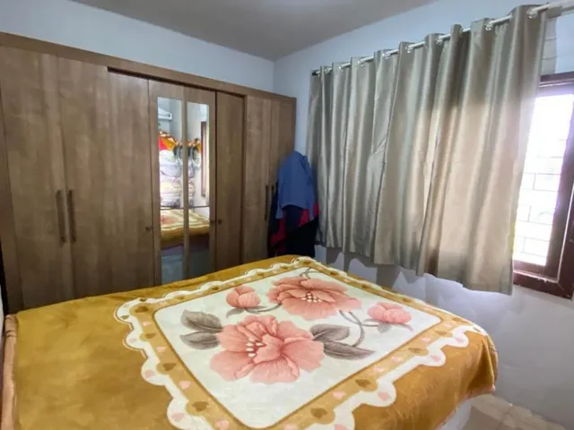 Imagem 7: Casa com 4 dormitórios à venda em localização privilegiada, próxima ao mar, na área