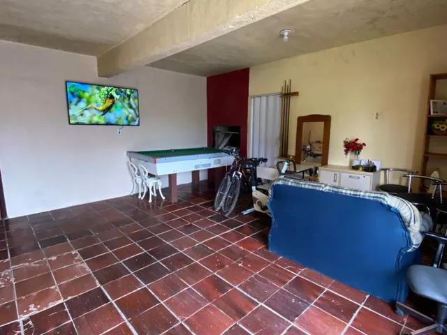 Imagem 9: Casa com 4 dormitórios à venda em localização privilegiada, próxima ao mar, na área