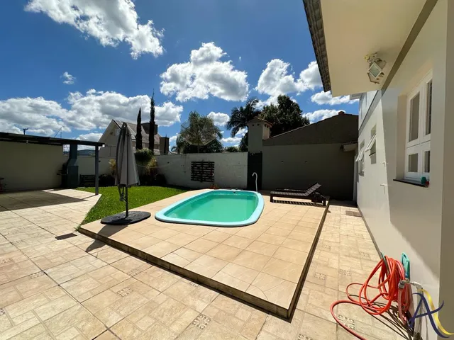 Imagem 6: Casa Completa com Suíte, Piscina, Churrasqueira e Garagem para 3 Carros em excelente