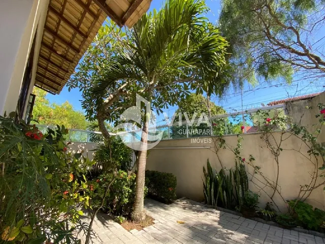Imagem 2: Ampla casa de alto padrão com 4 suítes e 3 vagas de garagem na Nova Guarapari