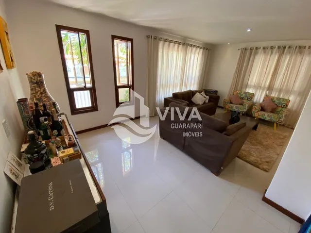 Imagem 7: Ampla casa de alto padrão com 4 suítes e 3 vagas de garagem na Nova Guarapari