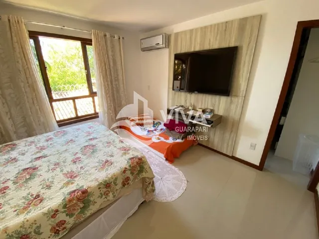 Imagem 9: Ampla casa de alto padrão com 4 suítes e 3 vagas de garagem na Nova Guarapari