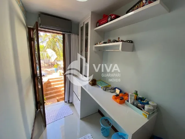 Imagem 13: Ampla casa de alto padrão com 4 suítes e 3 vagas de garagem na Nova Guarapari