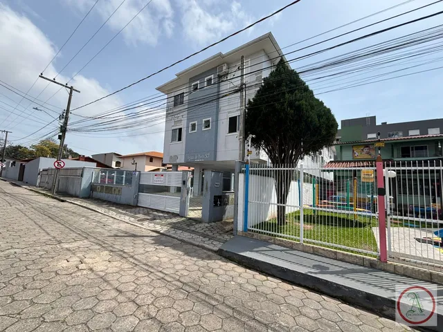 Imagem: O apartamento possui 2 Dormitórios, 1 Suíte, 2 Banheiros,