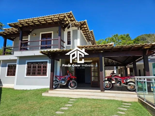 Imagem: A casa possui 5 Dormitórios, 3 Suítes, 5 Banheiros, 2