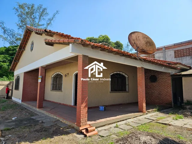 Imagem 3: Casa com 3 quartos sendo 1 suíte, sala em L, banheiro, cozinha , garagem coberta