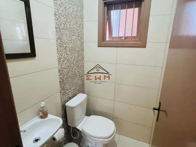 Imagem 6: Casa de esquina toda Mobiliada à venda em Torres - 4 Dormitórios, Churrasqueira e